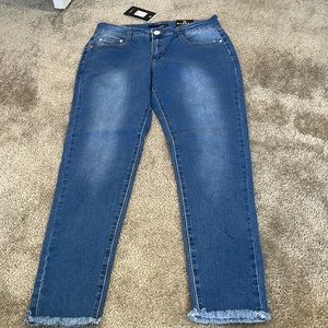 Fashion Nova Jeans w/ frayed bottoms.